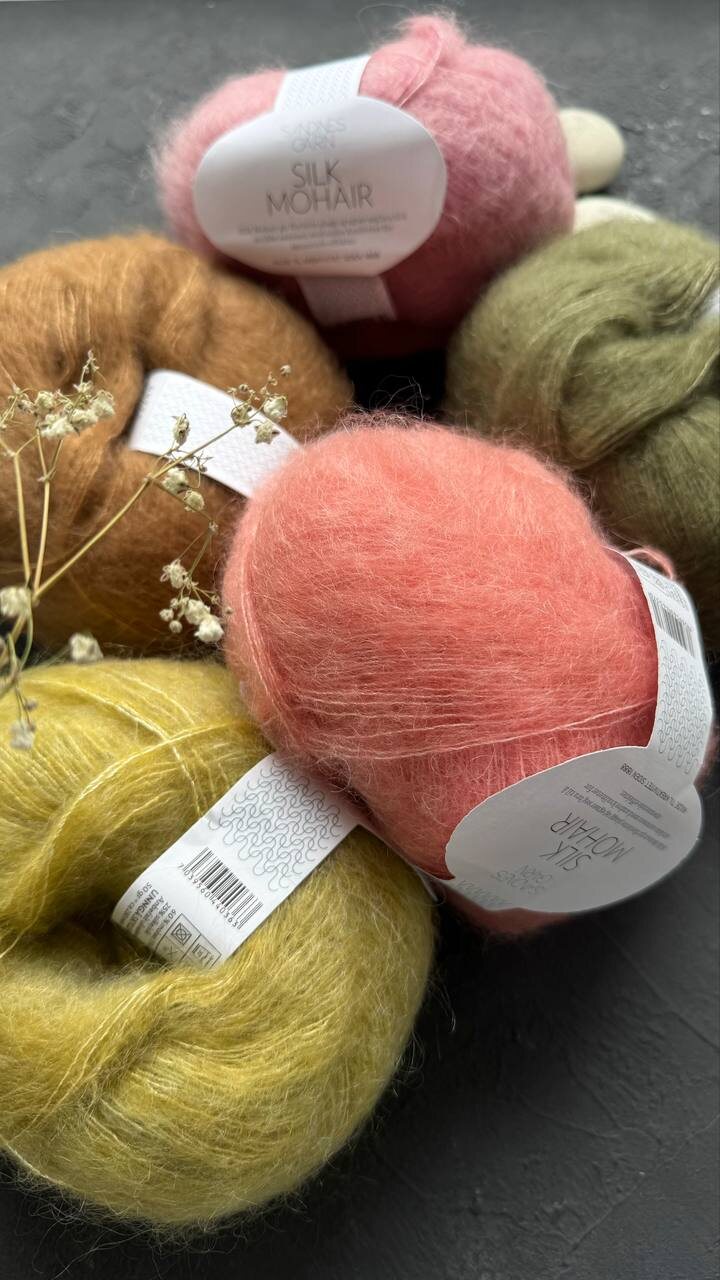 Самые классные паутинки получаются из Silk mohair Sandnes garn. Это нестандартный мохер: длина 50г/280м дает хорошую об